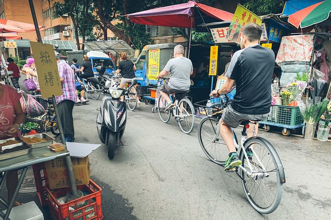 4-Hour Morning Cycling City Tour (incl. breakfast) - Dadaocheng Pier and the river view