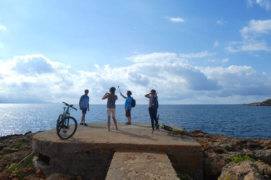 Alghero: Small Beaches E-Bike Tour with Aperitivo - The WWII bunkers and military remains
