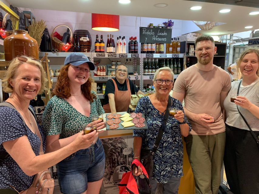Alicante: Guided Tapas Tour by Bike with Tastings - The promenade, old trees, and Santa Bárbara views