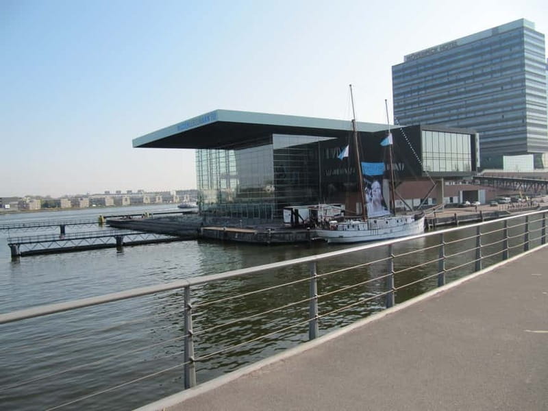 Amsterdam:: Bike Rental with Free Self-Guided Tour - Taking the ferry toward the Dutch countryside