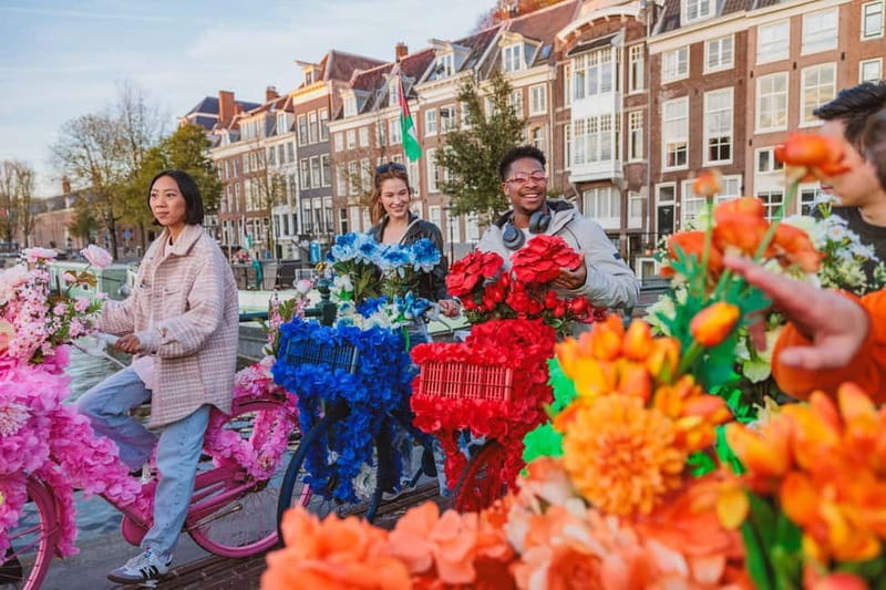 Amsterdam: City Centre, Guided Bike Tour on Flower Bikes - Dam Square and the ride back