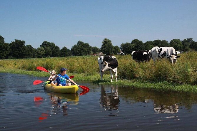 Amsterdam Countryside Bike and Kayak Tour - Leaving Amsterdam by bike from the A’DAM Tower