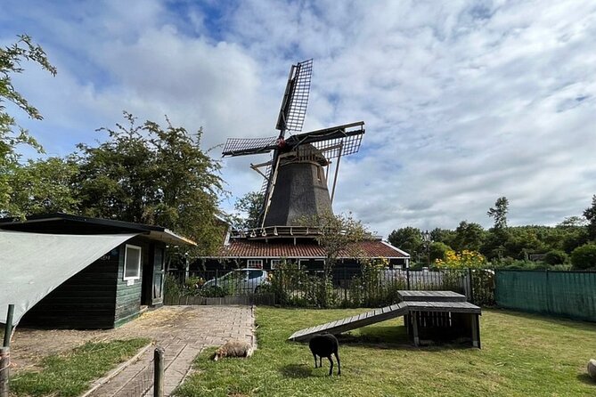 Amsterdam Countryside Bike and Kayak Tour - Crossing the canal by cable ferry