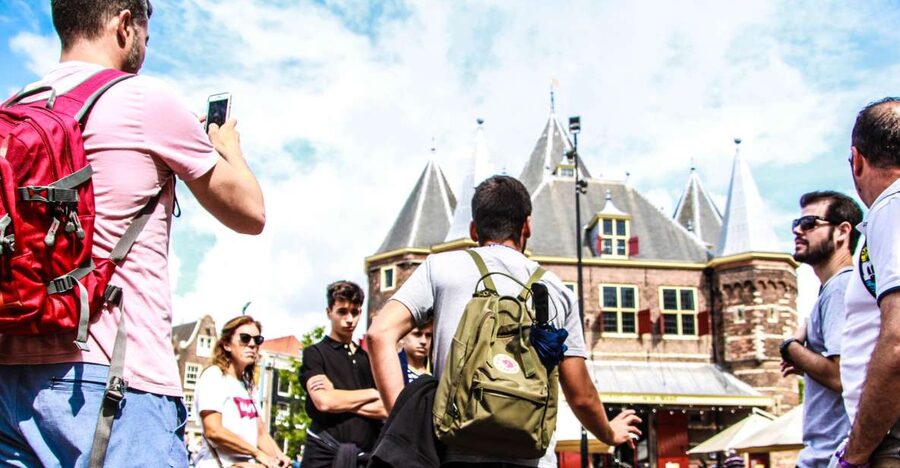 Amsterdam full day tour: Walking, Biking & Cruising - Starting at Beursplein and entering the old center