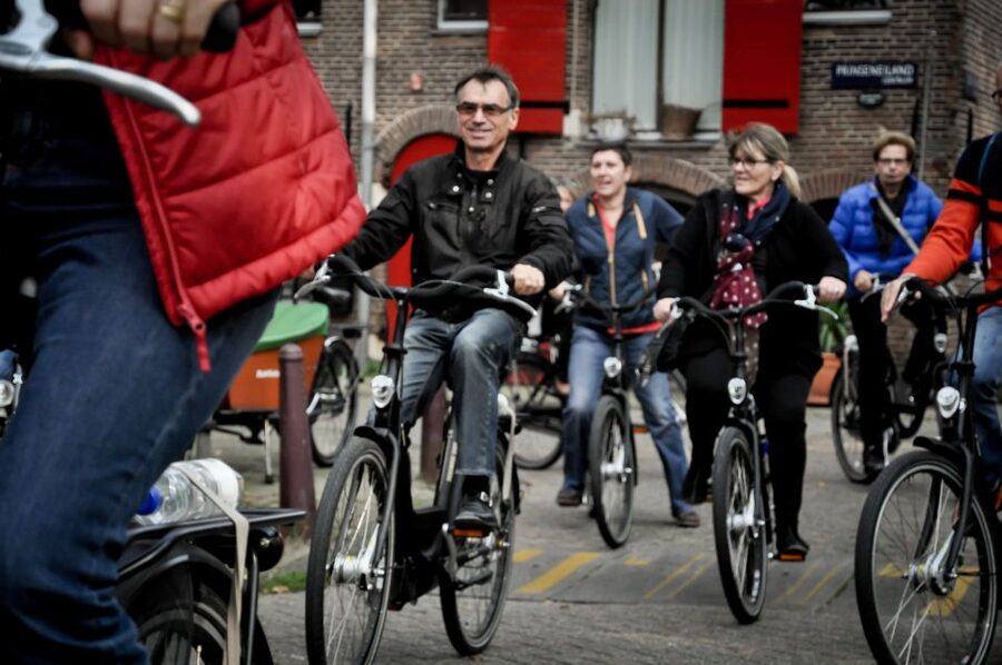 Amsterdam: Guided City Bike Tour in French - The Nine Streets and Amsterdam’s canal belt