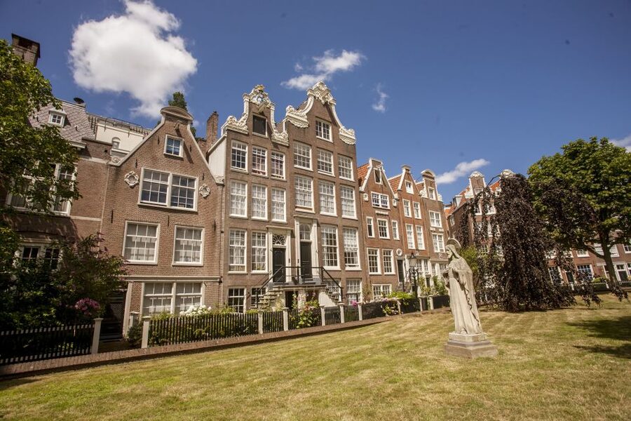 Amsterdam: Hidden Gems & Highlights Guided Bike Tour - The café break keeps the pace comfortable