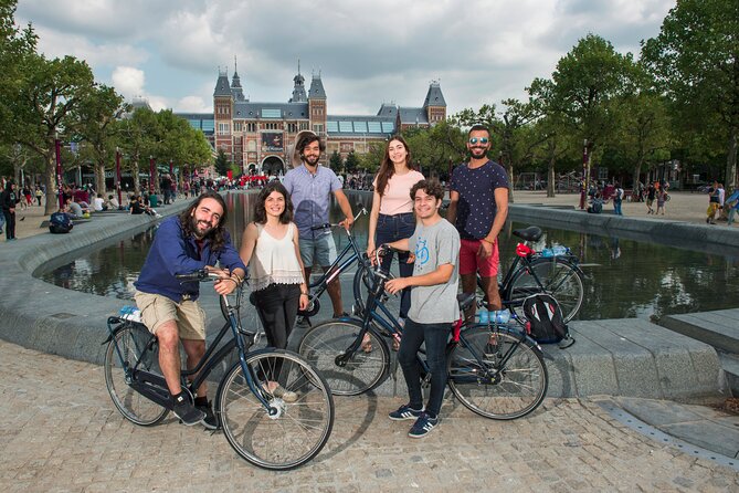 Amsterdam Highlights Bike Tour - Guided in EN/ES/DE/NL - Group size, languages, and the pace of the ride