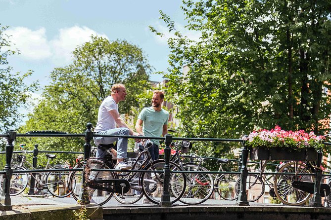 Amsterdam PRIVATE Bike Tour With Locals: Bike & Local Snack Included - Meeting near Centraal Station