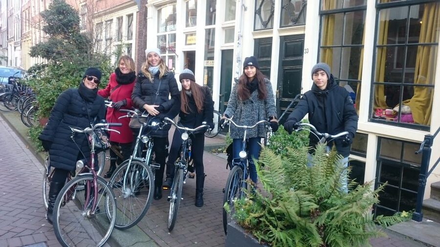 Amsterdam: Private City Bike Tour in italian - The Canal Belt and Amsterdam’s merchant houses