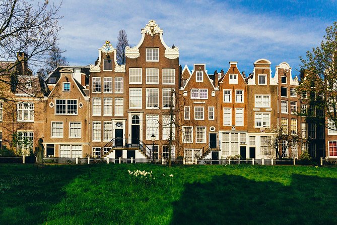 Amsterdam Private Tour: Highlights & Hidden Gems by Bike or Foot - Flower Market, local food, and a small taste of Amsterdam