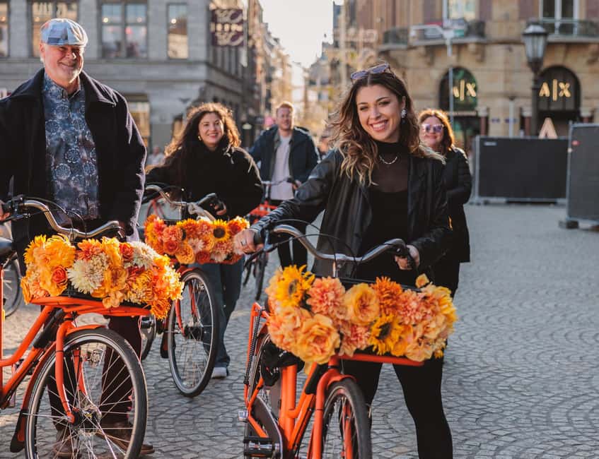 Amsterdam: Top Highlights Guided Bike Tour - Dam Square and a simple finish