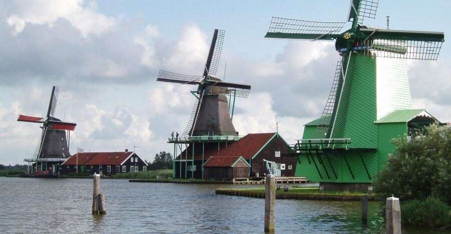 Amsterdam: Zaanse Schans Windmills Bike Tour with Guide - The first ride along the Zaan River