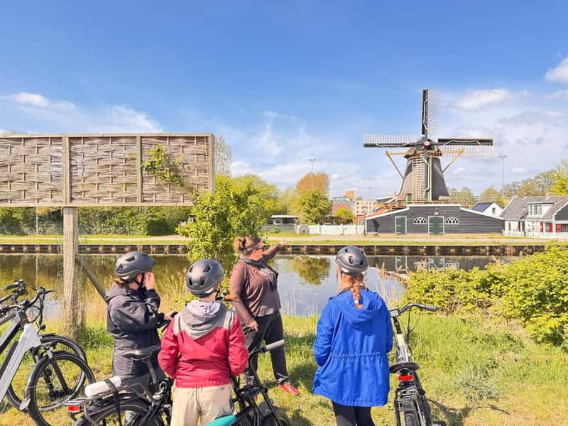 Amsterdam: Zaanse Schans Windmills & Zaandam E-Bike Tour - Ferry crossing and the first 20 minutes in Amsterdam-Noord