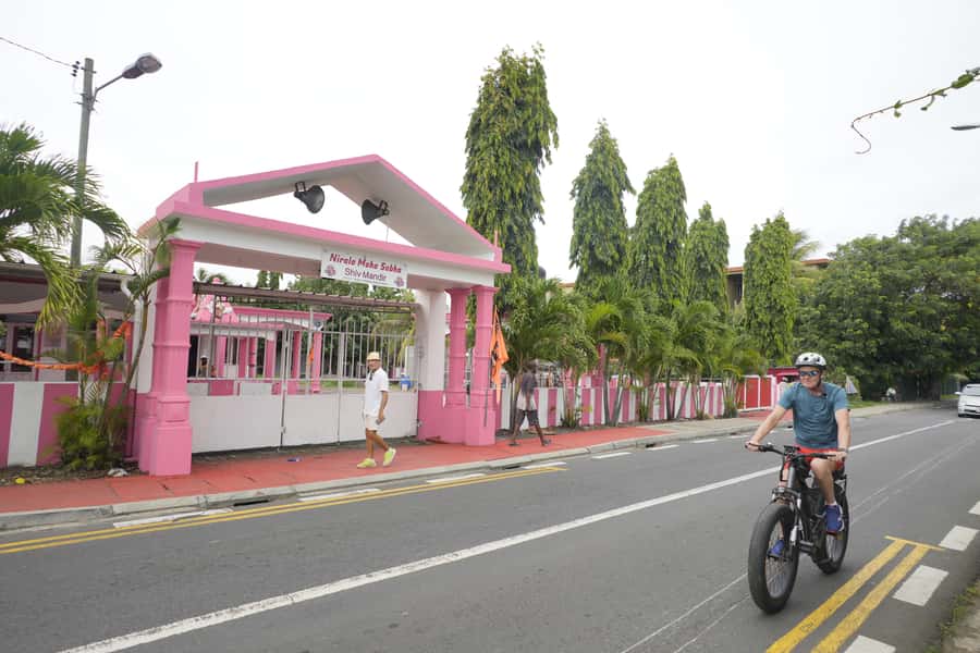 Authentic North East Coast E-bike Guided Tour - Temples, churches, and the island’s mixed culture