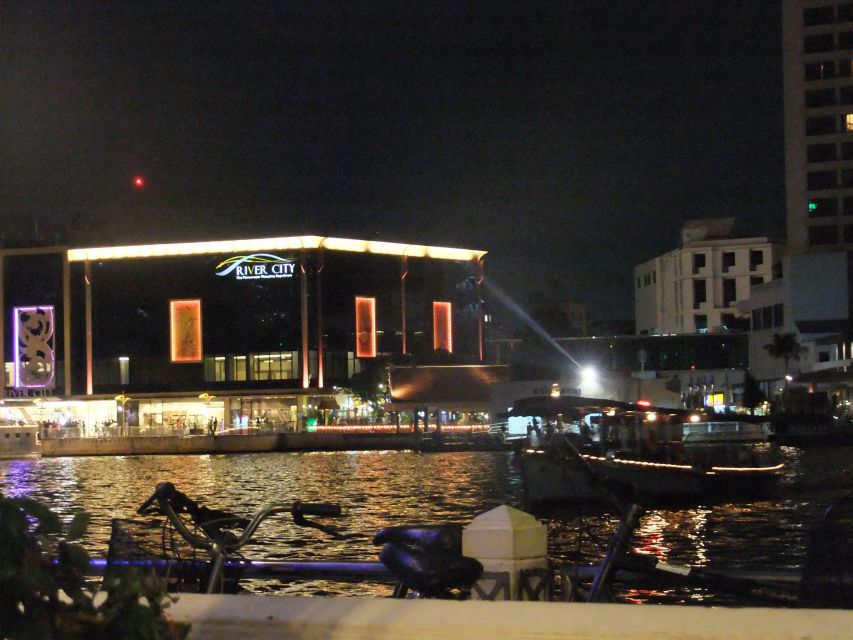 Bangkok by Night Cycling Tour with Street-food Meal - Crossing the Chao Phraya by ferry