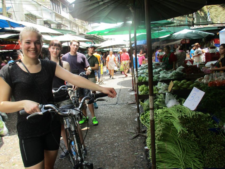 Bangkok Full-Day Bike Tour with Boat Transfer and Lunch - A fresh market full of fish, chickens, and unfamiliar vegetables
