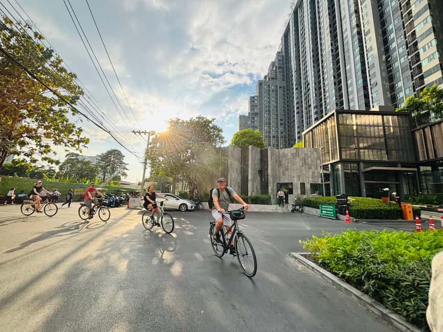 Bangkok: Temples, Canals & Local Life Bike Tour - Canals, wooden homes, and the city between the sights