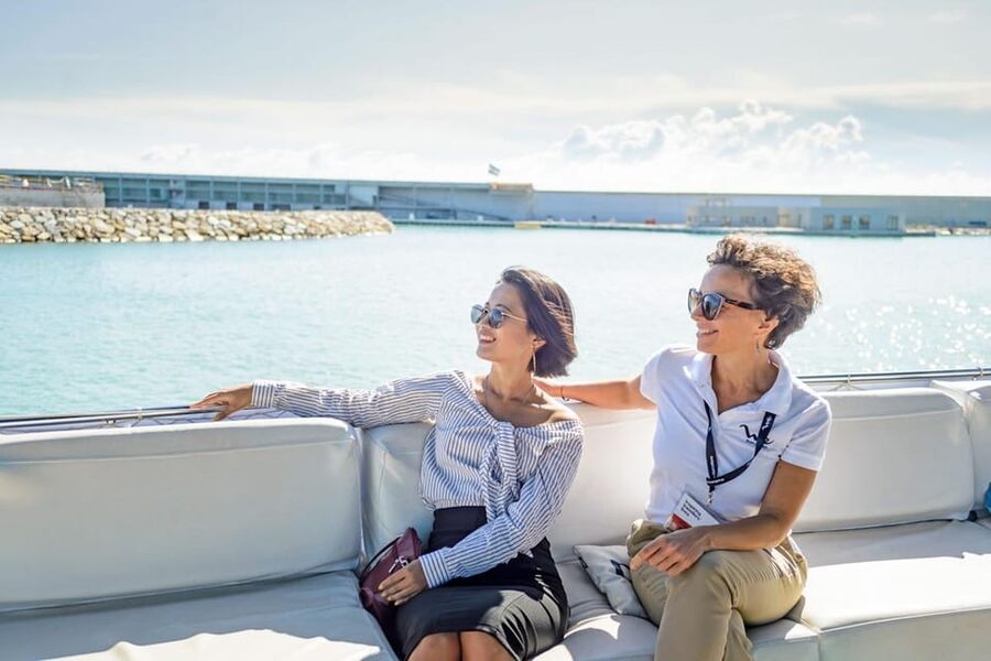 Barcelona: E-Bike Tour with Montjuic Cable Car & Boat Ride - Cycling down to Barcelona’s waterfront
