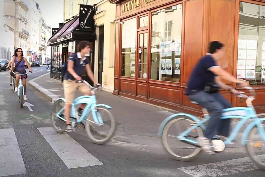 Best of Paris Bike Tour - The Rue Cler break and local food stop