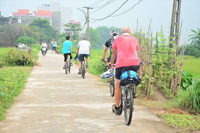 Bicycle Tours Hanoi: Full Day Bicycle Tour Hanoi Countryside - Crossing Long Bien Bridge into the countryside