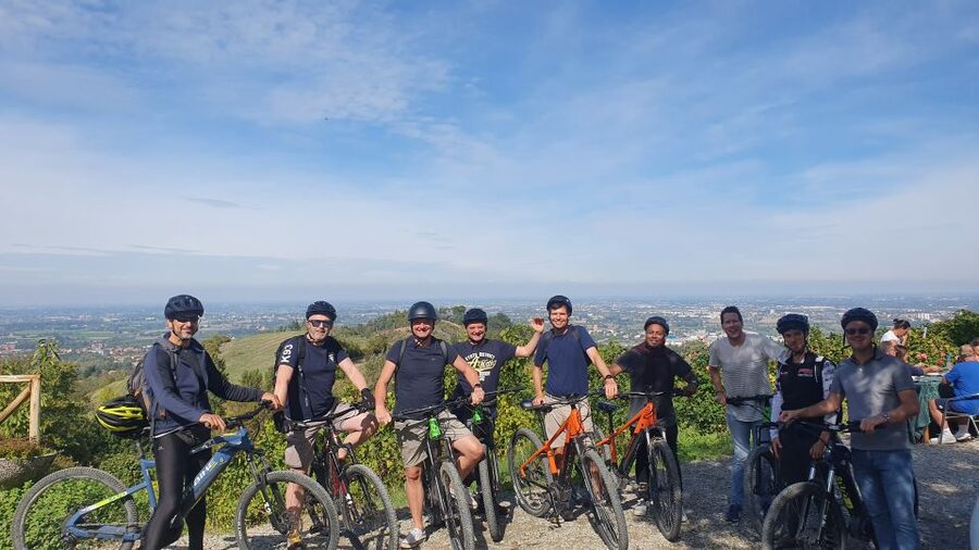 Bologna: E-Bike Guided Tour with Aperitivo - The aperitivo: wine, ham, cheese, and pastries