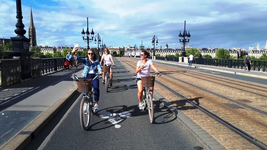 Bordeaux: Top Landmarks & Historic Bike Tour - Crossing the Garonne at Pont de Pierre