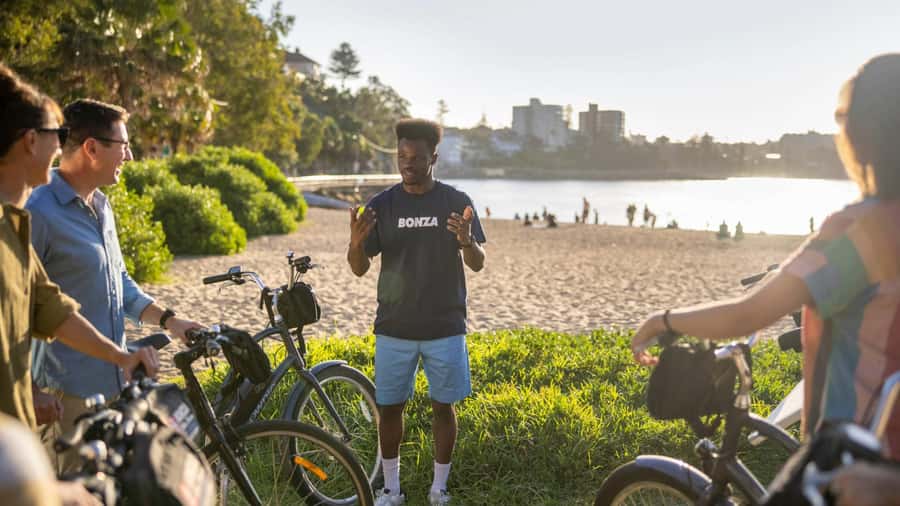 Breathtaking Manly Beach Bicycle and Sunset Cruise Tour - The ferry opens with Sydney’s big views