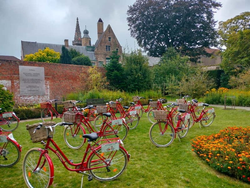 Bruges: Guided Retro Bike Tour of Highlights and Hidden Gems - The canals, Dijver, and medieval bridges