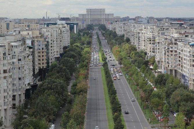 Bucharest Half a Day Bike Tour - The Palace of Parliament and communist scale