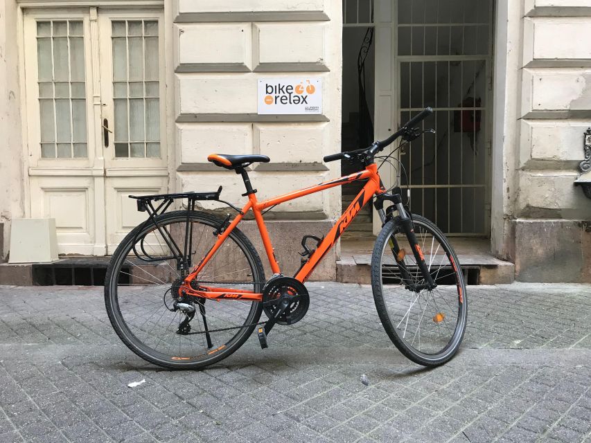 Budapest: Historic Downtown Bicycle Ride with Scenic Views - What the Guide Adds