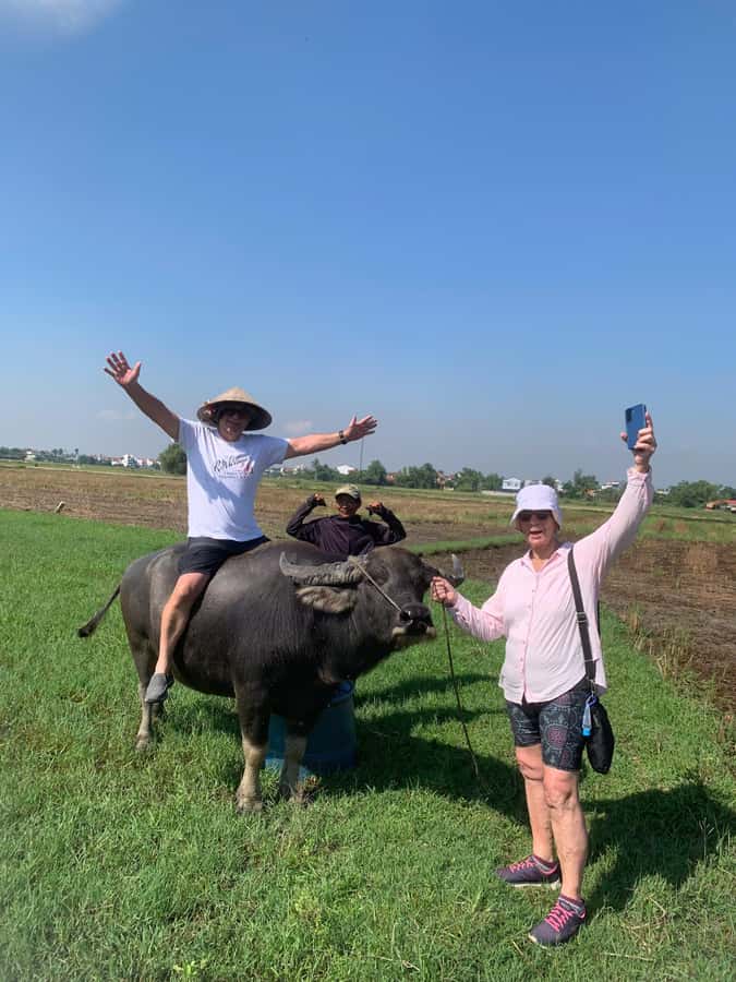 BUFFALO RIDING -BASKET BOAT & BIKE TOUR-HOI AN - Paddling through the nipa palm forest