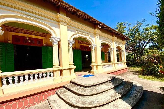 Cai Be Mekong Delta Tour: Cooking Class, Cycling & Craft Villages - Entering Cai Be’s antique wooden homes