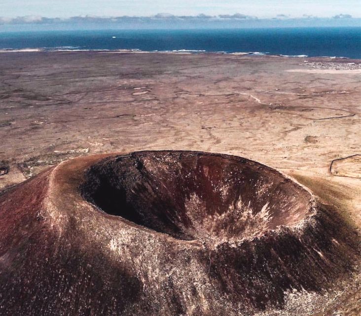 Caleta de Fuste/Corralejo: Guided E-Bike Tour & Crater Hike - One hour at El Cotillo lagoon