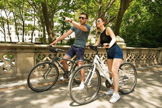 Central Park Bike Rental: Quality Bikes with Map, Helmet, Lock - Family riding with baby seats and tag-alongs