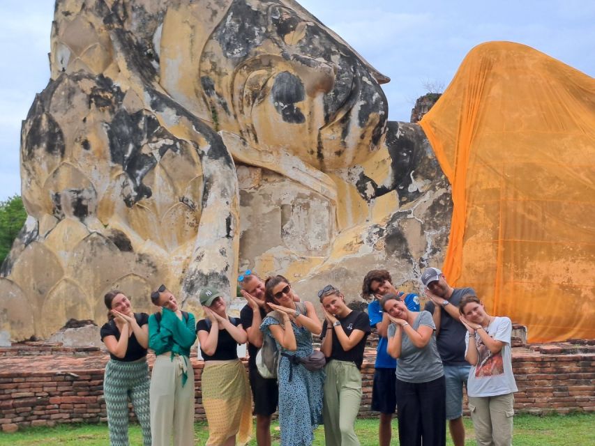 Colors of Ayutthaya: UNESCO Heritage 6 hour Bicycle Tour - Local market treats and the reclining Buddha