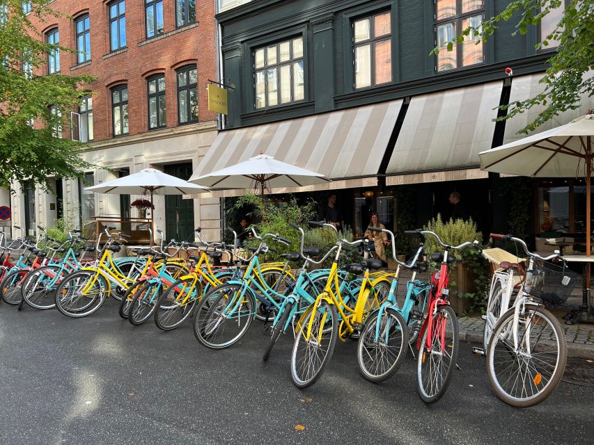 Copenhagen: City Highlights Guided Bike Tour - Nyhavn, colorful streets, and good photo pauses
