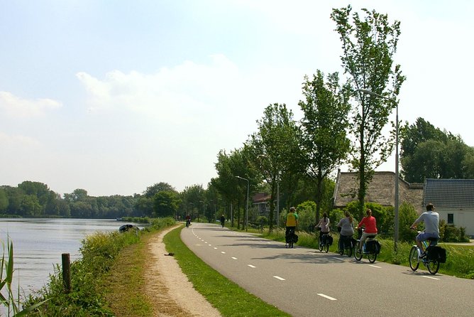 Countryside Bike Tour from Amsterdam: Cheese, Clogs & a Windmill - Cheese, clogs, and a taste of working tradition