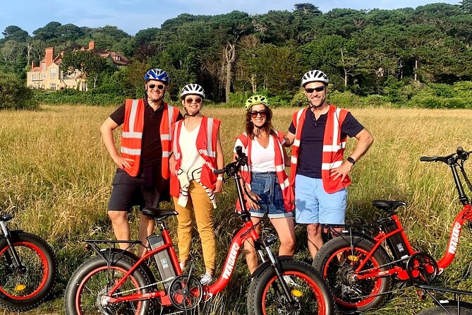 Dublin Panoramic e-Bike Tour with Howth Adventures - Baily Lighthouse and the view toward Doldrum Bay