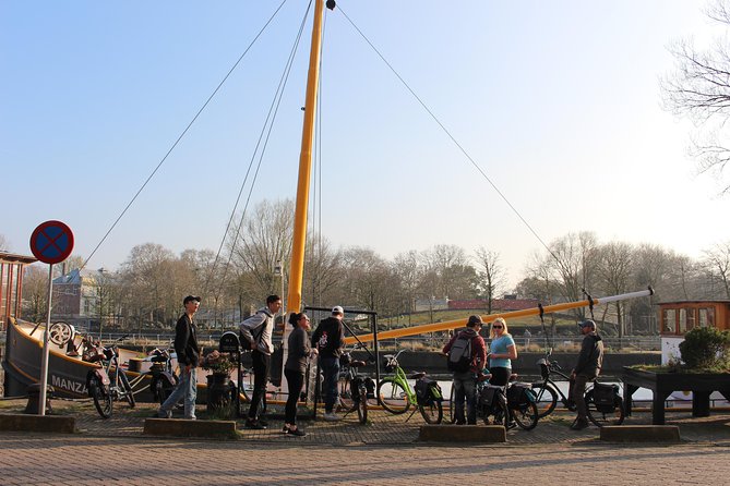 E-Bike Tour, Amsterdam's Highlights and Hidden Gems - Magere Brug and the houseboats