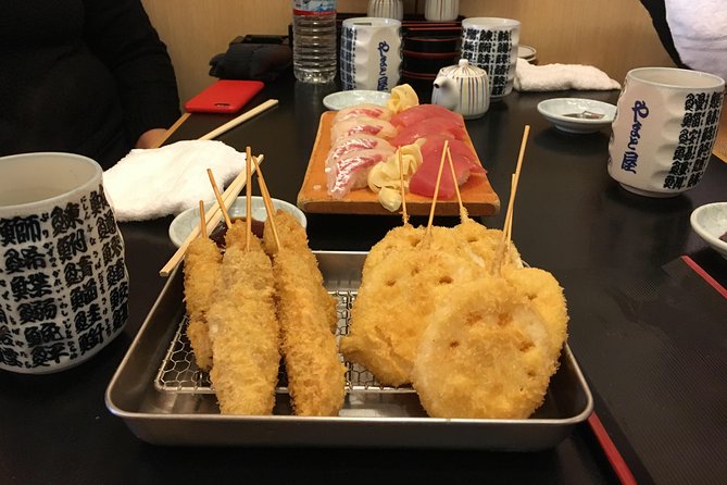 Eat, Drink & Cycle: Osaka Foodie Bike Tour - Tower Knives brings a hands-on pause