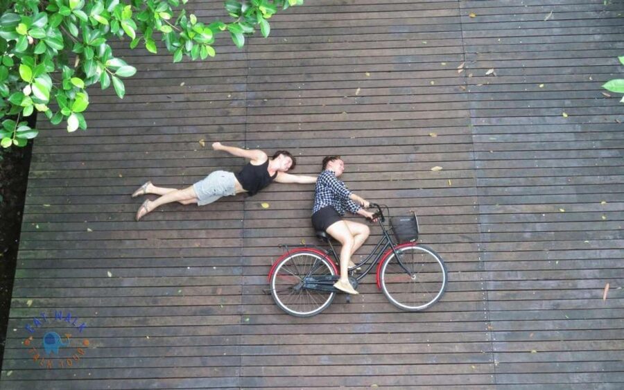 Explore Bangkok jungle by bike, kayak & boat - small group - The longtail boat and the port contrast