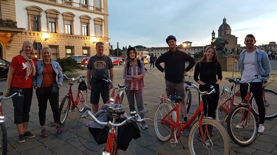 Florence at Night Bike Tour with Wine and Aperitivo Picnic - Riding the Lungarno at sunset