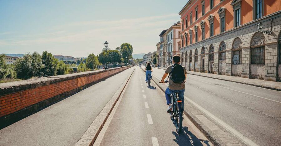 Florence: Night Tour by Electric Bike - Crossing the Arno toward the big view