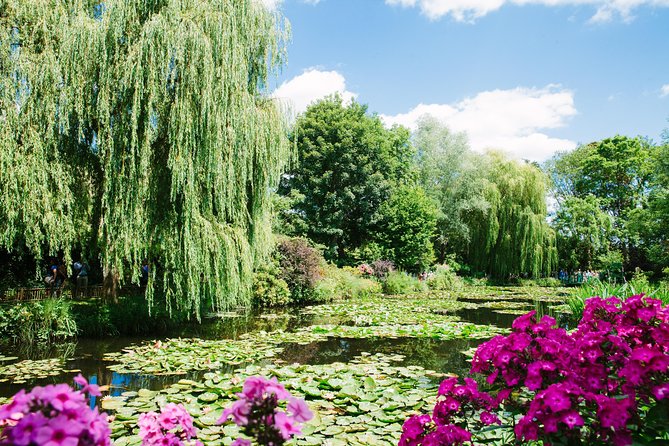 From Paris: Monet Gardens & Giverny Bike Tour with Picnic Stop - Riding the country path to Giverny