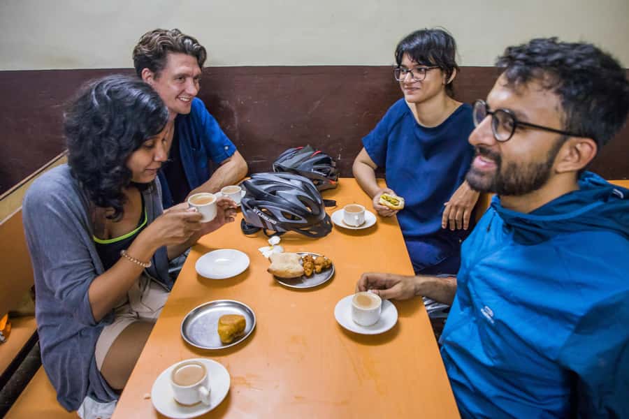 Goa: Old Goa and Divar Island E-Bike Tour with Snacks - Meeting local people over Goan snacks