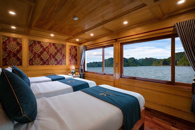 Halong Bay 2 days on classic cruise, small group, biking-kayaking - Sunset, spring rolls, squid fishing, and dinner