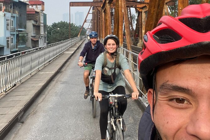 Hanoi City Bike Tour through Banana Island & Food Tasting - Crossing Long Bien Bridge