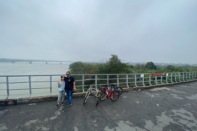 Hanoi City Bike Tour through Banana Island & Food Tasting - Railway tracks and cafés