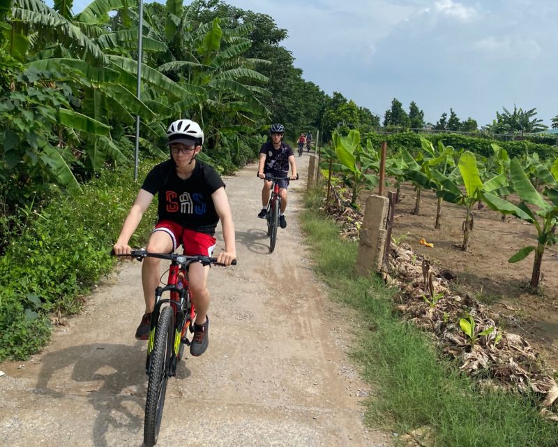 Hanoi Countryside Bicycle Tour - Long Bien Bridge or a Small Boat Across the River