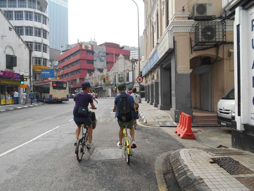 Hidden Kuala Lumpur: 4-Hour Bike Tour - Riding through the narrow passages